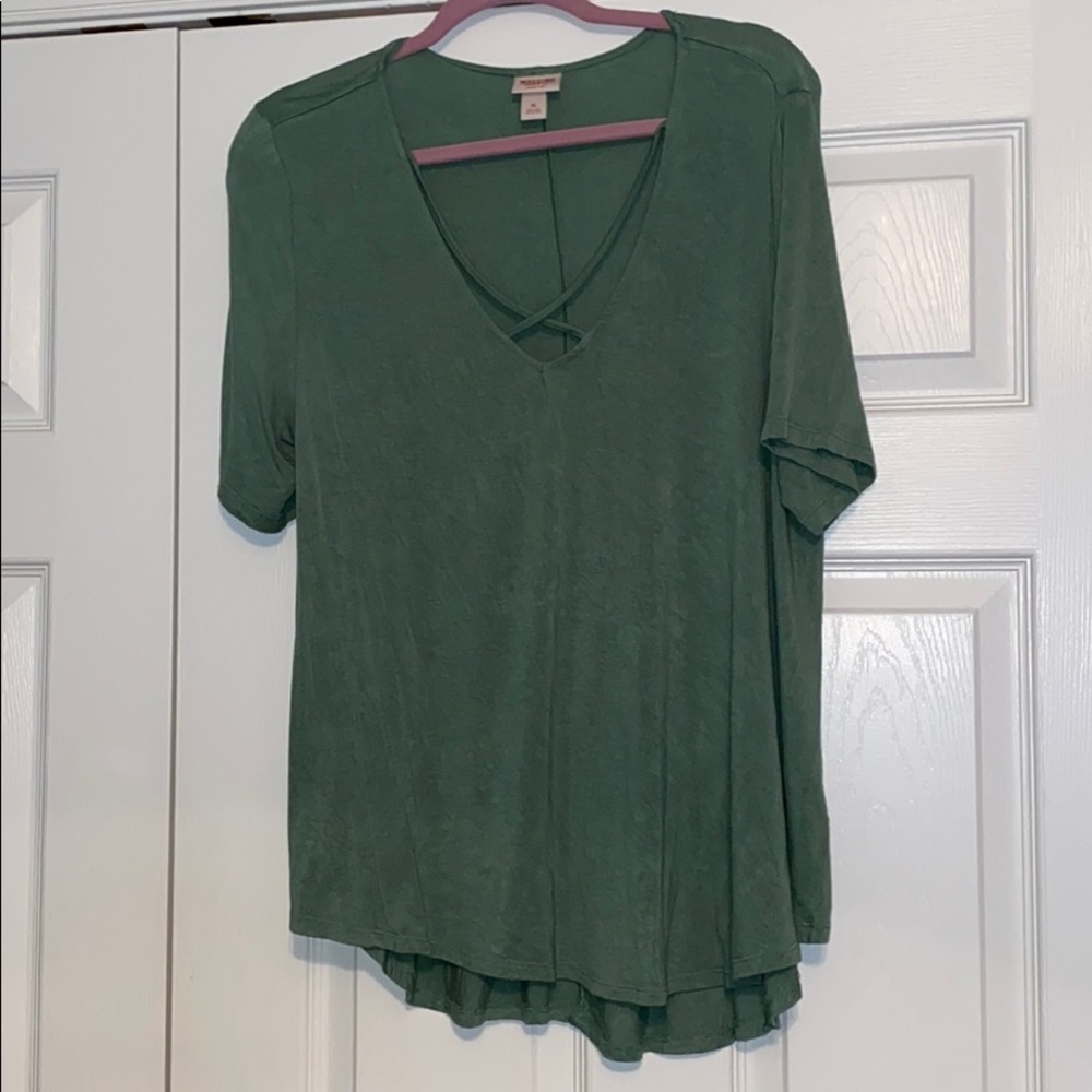 A olive green light shirt. Never worn.
